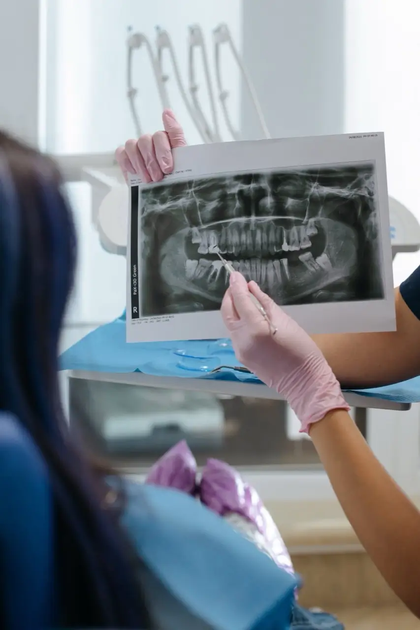 Family smiling together at the dentist